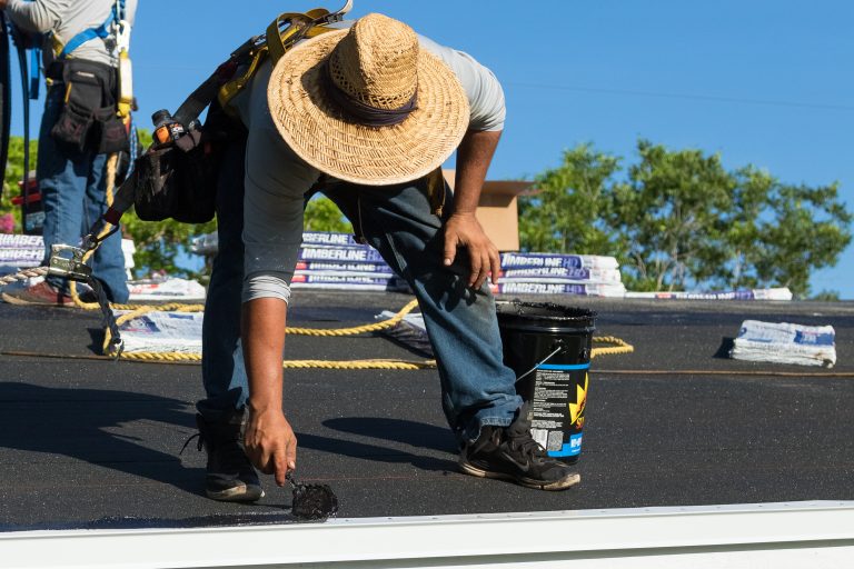 roof underlayment guy installing new roof