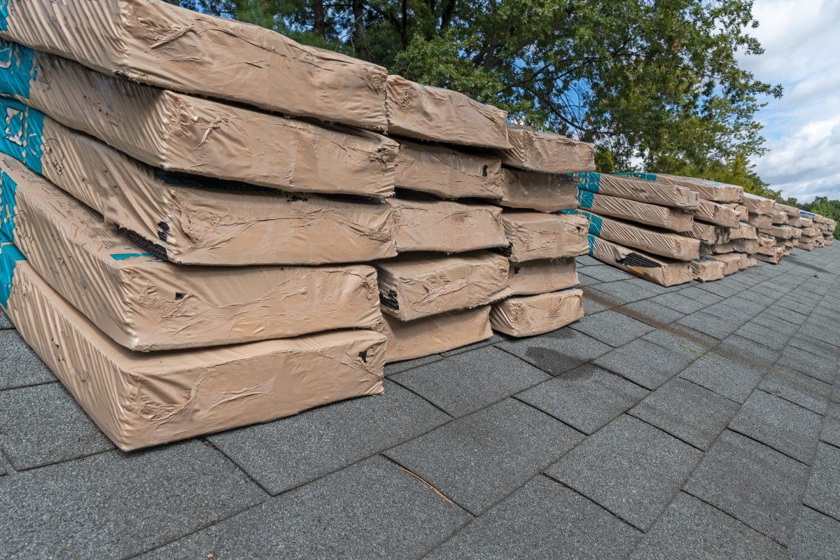 roof replacement process material on top of roof